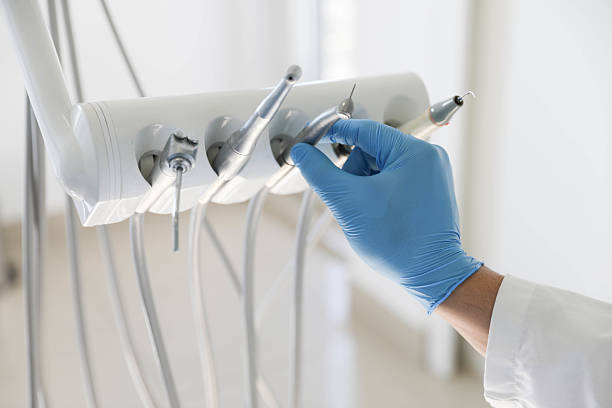 Professional Tooth Extraction technician working in Fairfield, TX